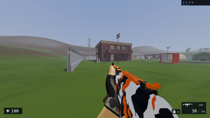 Green hills around a base, a brick outpost and a red container ahead